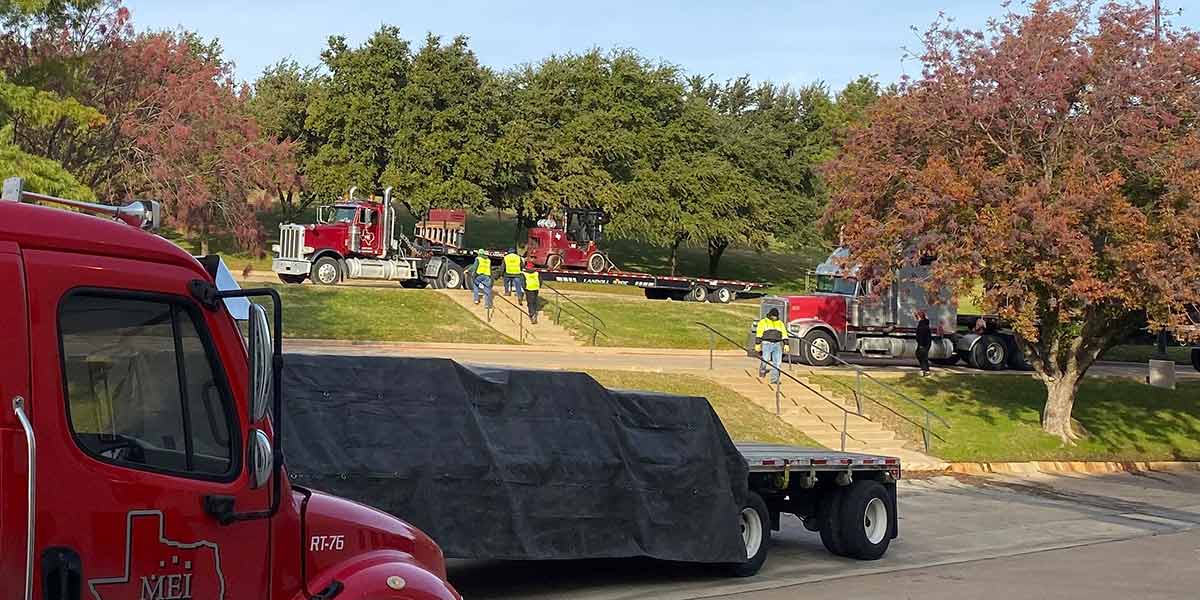 trucks loaded with the equipment