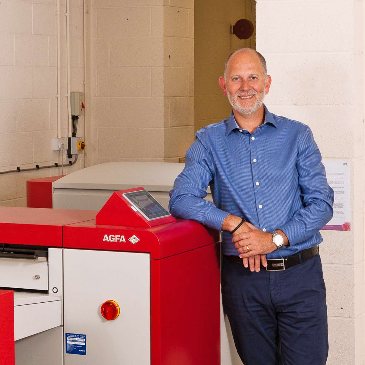 Darren-Horrox-agfa-ctp Darren Horrox next to his Agfa CtP system